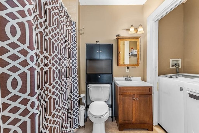 129 Vernon St Unit B, Norwood, MA 02062 - bathroom featuring washing machine and dryer, vanity, toilet, and curtained shower