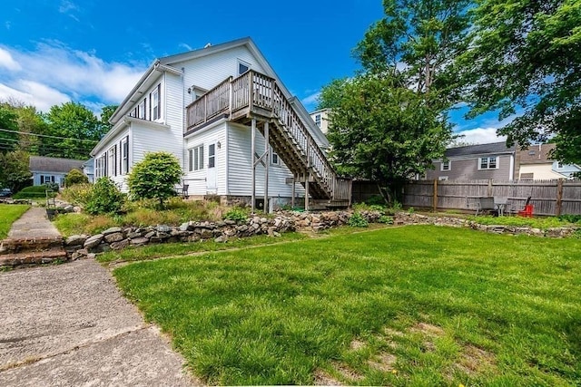 129 Vernon St Unit B, Norwood, MA 02062 - view of home's exterior with stairway and a deck
