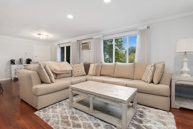 living room featuring crown molding, a wall mounted air conditioner, and dark hardwood / wood-style flooring