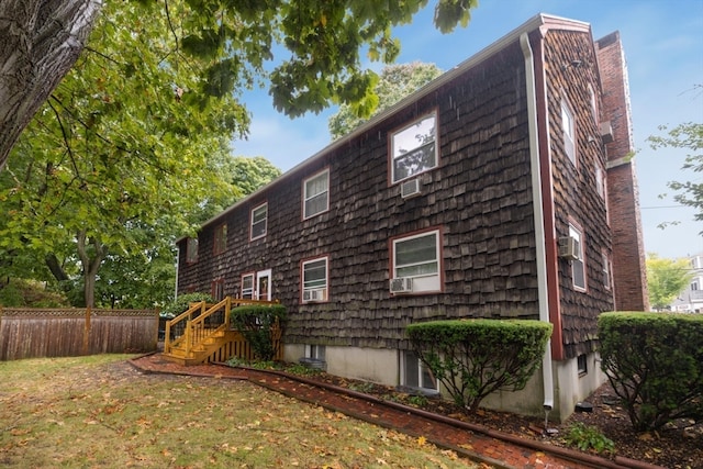 view of home's exterior featuring a yard