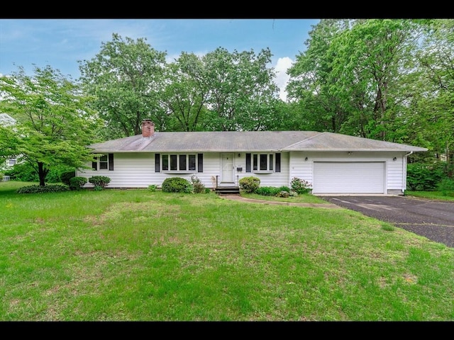557 Maple Rd, Longmeadow, MA 01106 - ranch-style home with a garage, a front yard, and driveway