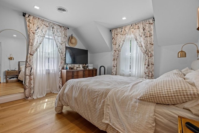 100 Ashland St, Lynn, MA 01905 - bedroom featuring multiple windows, wood finished floors, and vaulted ceiling
