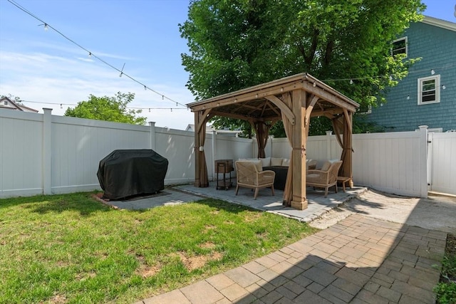 100 Ashland St, Lynn, MA 01905 - fenced backyard with a gazebo, outdoor lounge area, and a patio