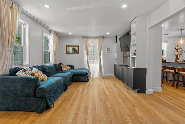 100 Ashland St, Lynn, MA 01905 - living area featuring light wood-style floors, healthy amount of natural light, and recessed lighting