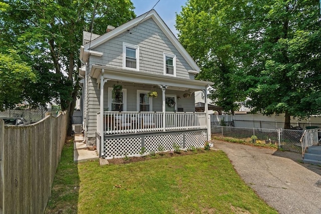 100 Ashland St, Lynn, MA 01905 - view of front of property with covered porch and a chimney