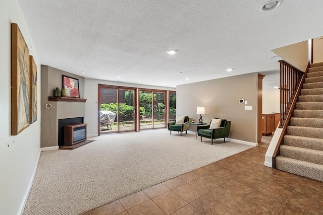 525 Tumbling Hawk Unit 525, Acton, MA 01720 - carpeted living area featuring a textured ceiling, stairs, baseboards, and recessed lighting