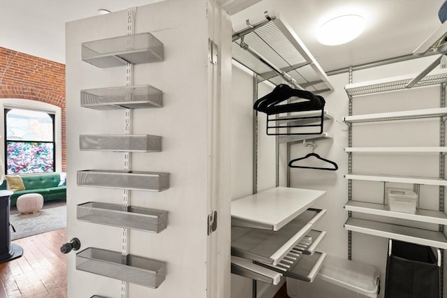 spacious closet with wood-type flooring