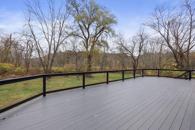 wooden deck featuring a wooded view