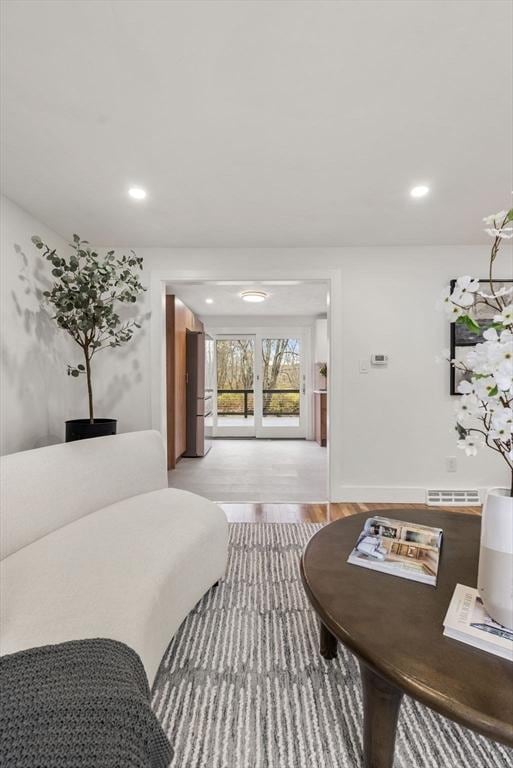 bedroom featuring recessed lighting, access to outside, visible vents, and wood finished floors