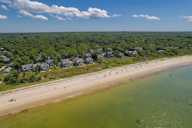 aerial view featuring a water view and a view of trees