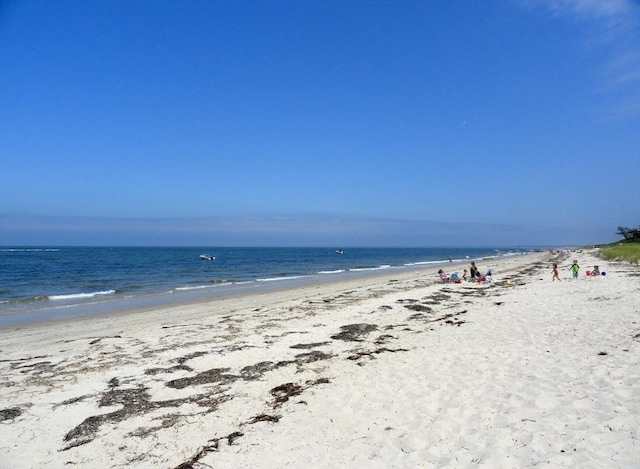 property view of water featuring a view of the beach