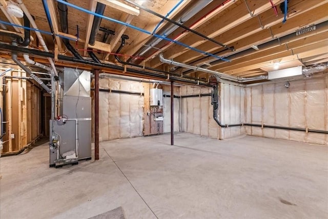 6 Nicols Way Unit 6, Easthampton, MA 01027 - unfinished below grade area with heating unit and water heater