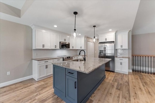 6 Nicols Way Unit 6, Easthampton, MA 01027 - kitchen with stainless steel appliances, white cabinets, backsplash, light wood-type flooring, and recessed lighting