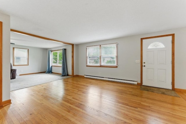215 Pine Acre Rd, Springfield, MA 01129 - entryway featuring a baseboard radiator, light wood-style floors, and baseboards