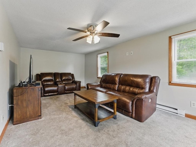 215 Pine Acre Rd, Springfield, MA 01129 - living room with a baseboard heating unit, ceiling fan, light carpet, a textured ceiling, and baseboards