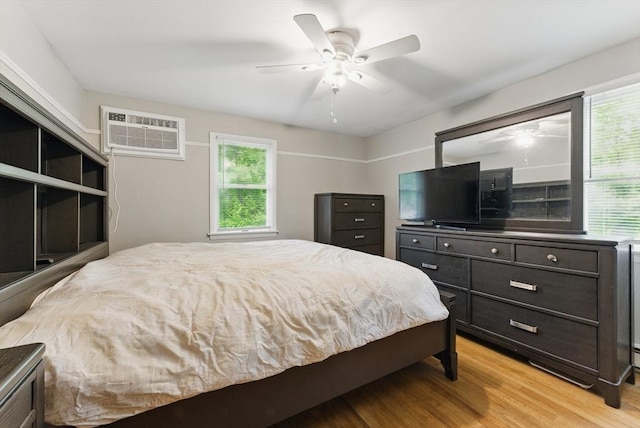215 Pine Acre Rd, Springfield, MA 01129 - bedroom featuring light wood-type flooring, an AC wall unit, and a ceiling fan