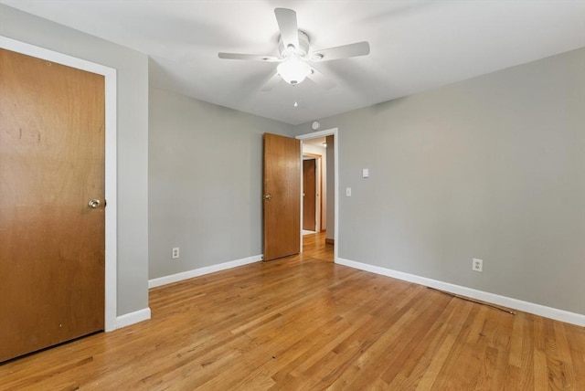 215 Pine Acre Rd, Springfield, MA 01129 - unfurnished bedroom featuring baseboards, light wood-style flooring, and ceiling fan