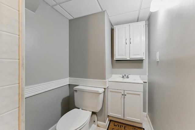 215 Pine Acre Rd, Springfield, MA 01129 - bathroom featuring a drop ceiling, toilet, vanity, and baseboards