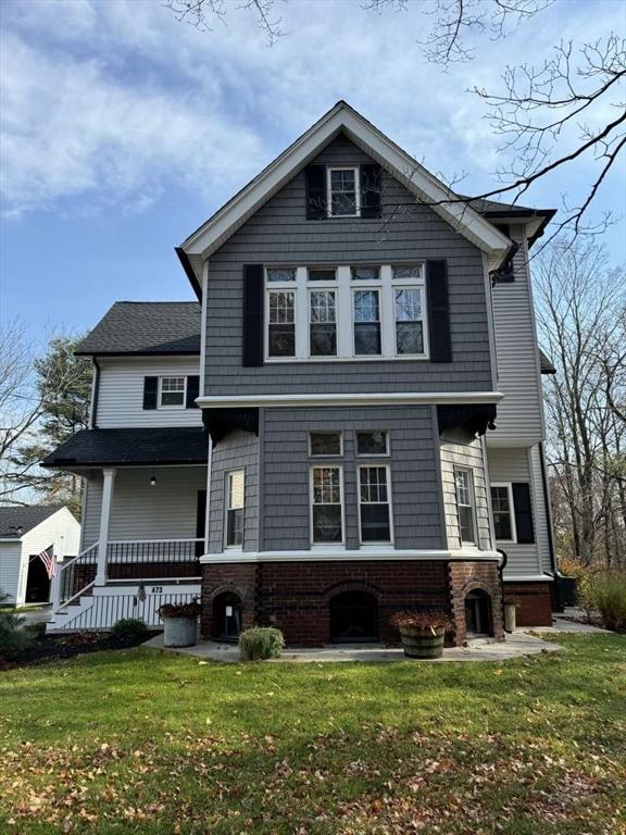 473 Massasoit Rd, Worcester, MA 01604 - view of front of home with a front yard and covered porch