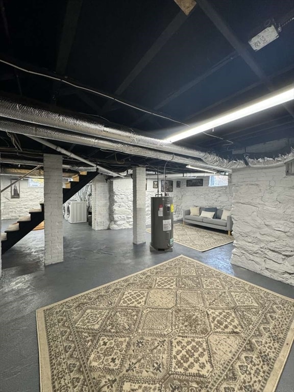 basement featuring electric water heater