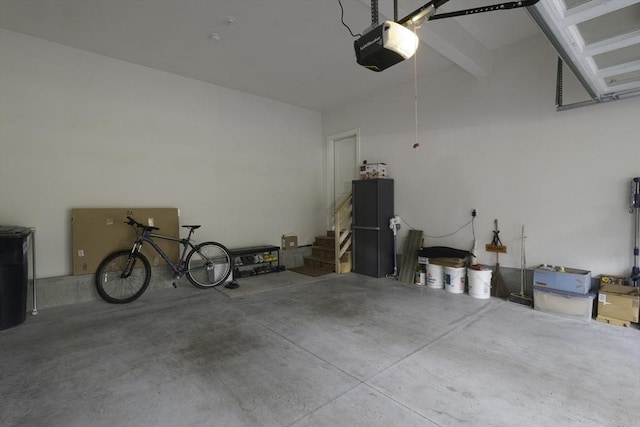 garage featuring a garage door opener