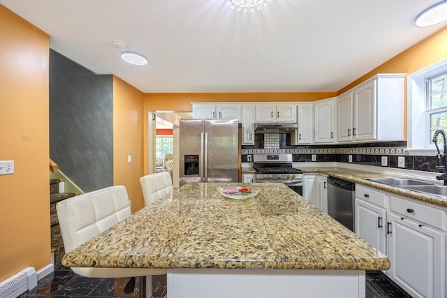 68 Ice Pond Dr, Northampton, MA 01062 - kitchen featuring appliances with stainless steel finishes, a sink, ventilation hood, and white cabinetry