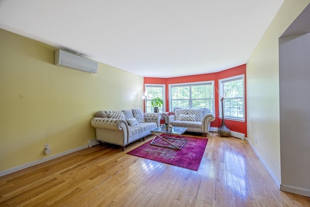 68 Ice Pond Dr, Northampton, MA 01062 - living room featuring a wall mounted air conditioner, light wood-style floors, baseboards, and a baseboard heating unit