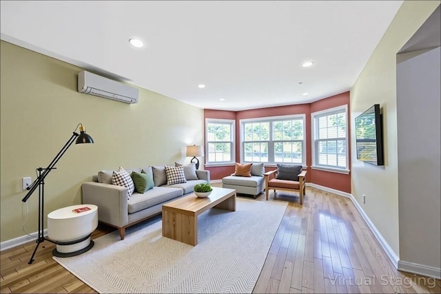 68 Ice Pond Dr, Northampton, MA 01062 - living area featuring a wall unit AC, light wood-type flooring, baseboards, and recessed lighting
