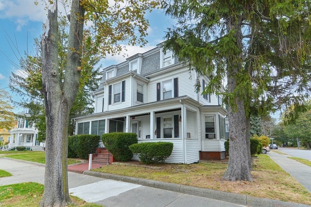 view of front of home featuring covered porch