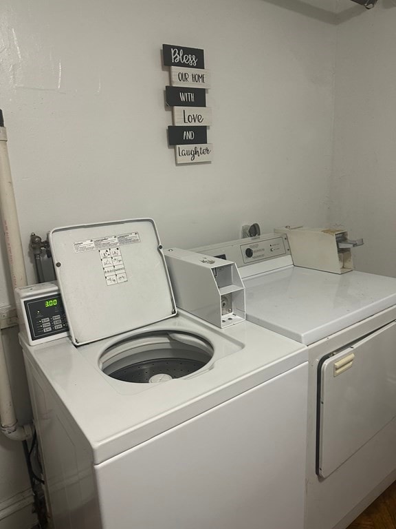 washroom with washer and clothes dryer