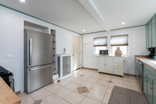 kitchen featuring beamed ceiling, light countertops, recessed lighting, light tile patterned flooring, and stainless steel appliances