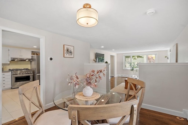 286 Laurel St, Melrose, MA 02176 - dining area with recessed lighting, baseboards, a baseboard radiator, and light wood finished floors