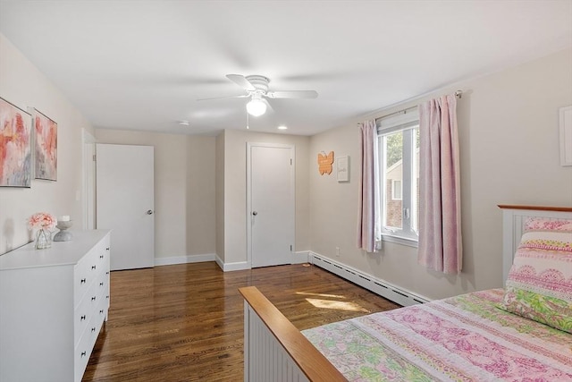 286 Laurel St, Melrose, MA 02176 - bedroom with a baseboard radiator, dark wood-style flooring, a ceiling fan, and baseboards