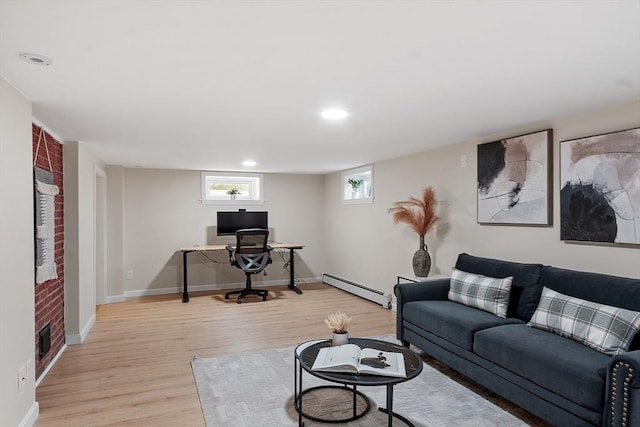 286 Laurel St, Melrose, MA 02176 - living area with a baseboard heating unit, a desk, light wood finished floors, baseboards, and recessed lighting