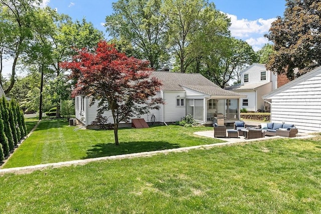 286 Laurel St, Melrose, MA 02176 - back of property with an outdoor hangout area, a sunroom, a yard, and central AC