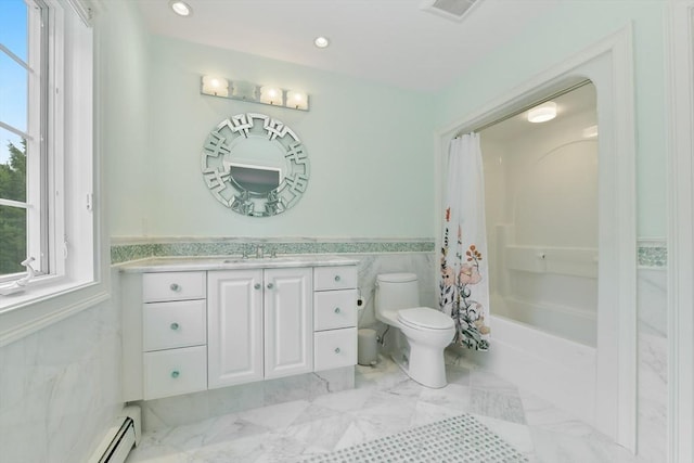 full bathroom with shower / bathtub combination with curtain, toilet, a baseboard heating unit, wainscoting, and vanity