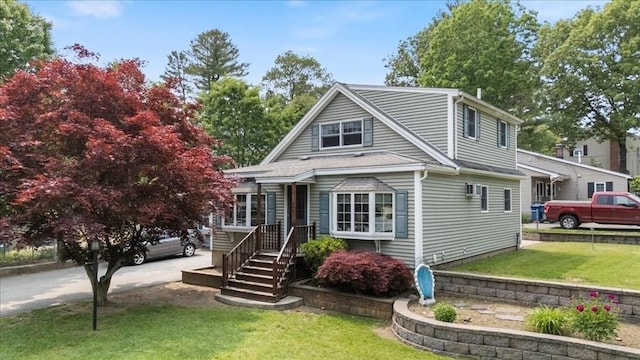 72 Heath St, Tewksbury, MA 01876 - view of front of house with a front yard
