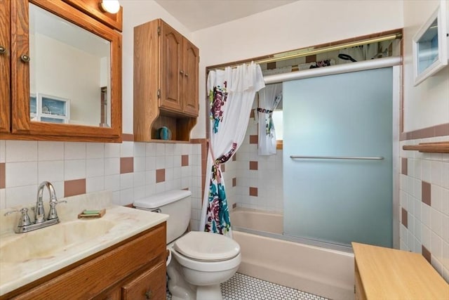 72 Heath St, Tewksbury, MA 01876 - full bath featuring tile walls, toilet, shower / bath combo with shower curtain, vanity, and tile patterned floors