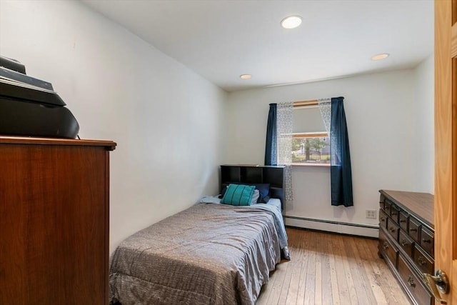 72 Heath St, Tewksbury, MA 01876 - bedroom with a baseboard radiator, wood-type flooring, and recessed lighting