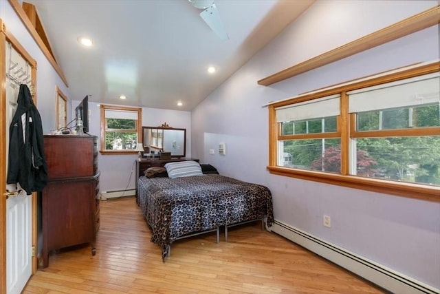 72 Heath St, Tewksbury, MA 01876 - bedroom featuring a baseboard heating unit, lofted ceiling, light wood-type flooring, and recessed lighting