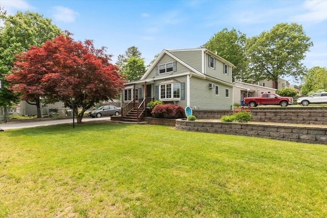 72 Heath St, Tewksbury, MA 01876 - view of front of home featuring a front lawn