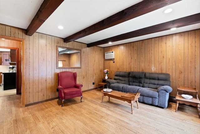 72 Heath St, Tewksbury, MA 01876 - living room featuring light wood finished floors, beam ceiling, a wall unit AC, wooden walls, and recessed lighting
