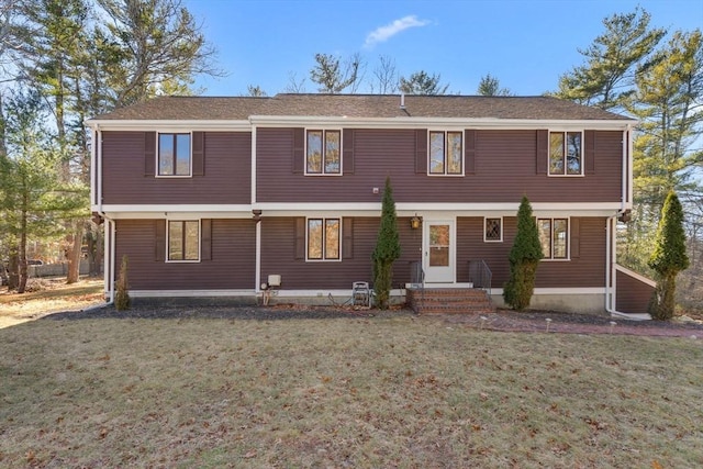 view of front of home featuring a front lawn