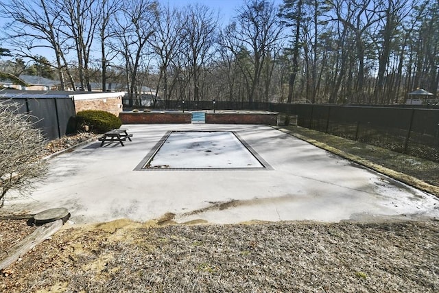 view of patio featuring fence