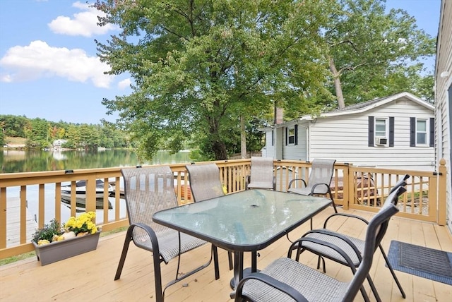 27 Lakeview St, Southwick, MA 01077 - wooden deck with a water view and outdoor dining space