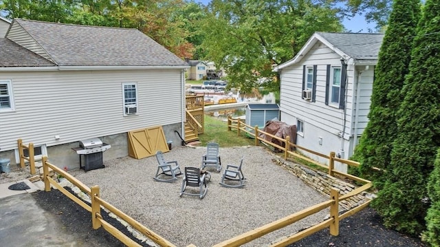 27 Lakeview St, Southwick, MA 01077 - exterior space with a patio area, fence, and an outdoor fire pit