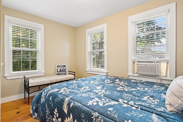 27 Lakeview St, Southwick, MA 01077 - bedroom featuring baseboards, wood finished floors, and cooling unit