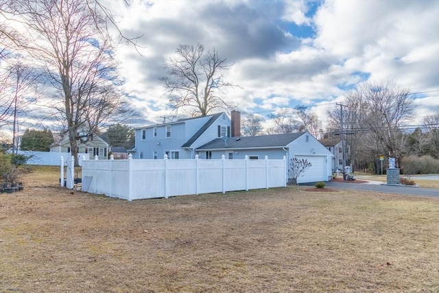 view of yard featuring a garage