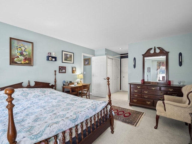 carpeted bedroom featuring a closet