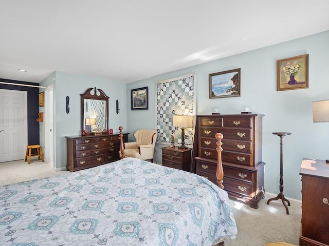 bedroom with light carpet